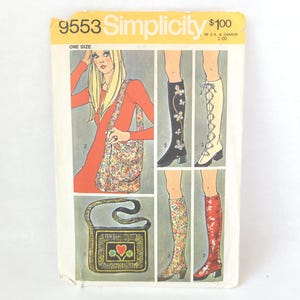 May include: A vintage Simplicity 9553 sewing pattern envelope featuring illustrations of a shoulder bag, a rectangular bag with a heart motif, and four styles of knee-high boots. The yellow header displays the pattern number and price.