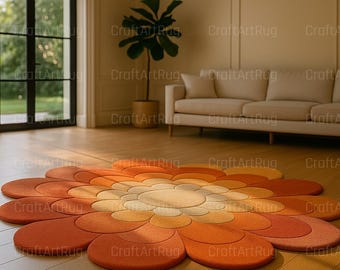 May include: A large, flower-shaped rug in shades of orange, yellow, and cream. The rug is on a hardwood floor in a living room setting. The text "CraftArtRug" is visible in the image.