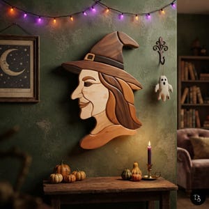 May include: A wooden wall art piece depicting the profile of a witch wearing a pointed hat. The artwork is crafted from various shades of natural wood, showcasing light and dark brown tones. The witch has a long nose and a subtle smile.