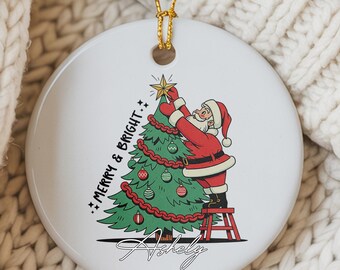 Santa Decorating Tree Ornament, "Merry & Bright" Christmas Ornament, Santa Claus Decor, Custom Name Ornament, Family Tradition Holiday Decor