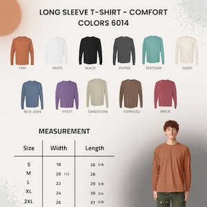 以下が含まれることがあります： Yam、White、Black、Seafoamなど、さまざまな色の長袖Tシャツのディスプレイ。画像には、Sから2XLまでのサイズ、幅45.7cmから66cm、長さ67.6cmから80.3cmの測定チャートが含まれています。