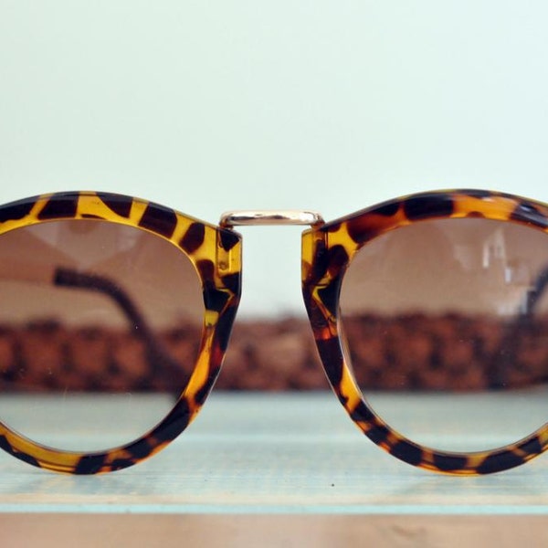 Les lunettes de soleil tortue chat