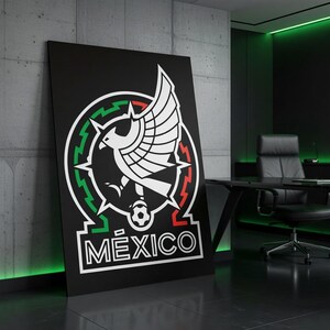 May include: A large black poster featuring the Mexican national team emblem. The emblem includes a white eagle with outstretched wings, a green and red border, and the word "M&Eacute;XICO" in white. The poster is displayed in a modern office setting.