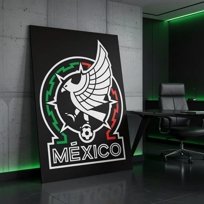 May include: A large black poster featuring the Mexican national team emblem. The emblem includes a white eagle with outstretched wings, a green and red border, and the word "M&Eacute;XICO" in white. The poster is displayed in a modern office setting.