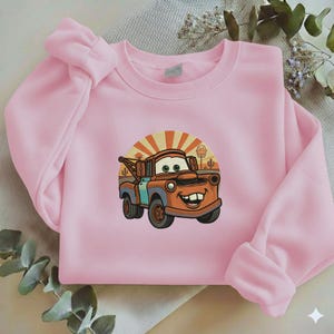 May include: A white ceramic mug with a black handle and the text "But First, Coffee" in a bold, black font. The mug is likely 11 ounces in size, perfect for a morning beverage.