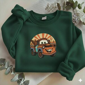 May include: A set of three ceramic mugs with a speckled, matte finish. The mugs are in shades of cream, light gray, and dark gray. Each mug has a simple, minimalist design and a rounded handle.