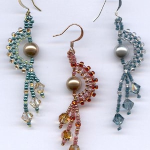 May include: Three pairs of beaded earrings with a pearl-like bead on each earring. The earrings are made with blue, green, and red beads.