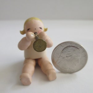 WuK Erzgebirge Wooden Sitting Baby WITHOUT her WINGS mfg by Wendt & Kuhn holding trumpet See Photos