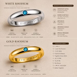 May include: Two rings with a single blue gemstone. The top ring is white rhodium with the engraving 12.07.2024 and a heart. The bottom ring is gold rhodium with the engraving S heart K 25.05.2024. Both rings are labelled as solid 925 sterling silver.