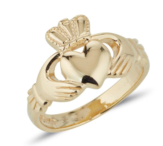 Ring with two hands and sale a heart in the middle