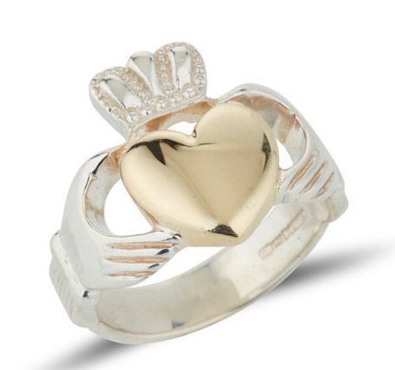 Silver and gold claddagh best sale ring