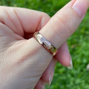 Gold Curved Wedding Ring with Ogham Engraving