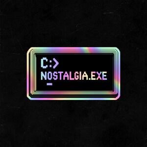 May include: A rectangular sticker with a holographic border and a black center. The center features pixelated light blue text that reads C:> NOSTALGIA.EXE with a blinking cursor underscore symbol at the end of the text line.