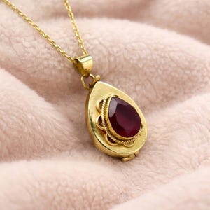 May include: A set of three ceramic mugs with a speckled, matte finish. The mugs are in shades of cream, light gray, and dark gray. Each mug has a simple, minimalist design and a rounded handle.