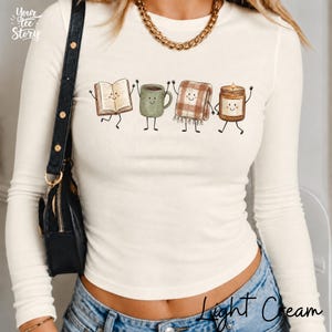Cozy Book Lover Long Sleeve Baby Tee: Autumn Reading, Coffee Crop Top, Reader Outfit, Fall Teacher Shirt, Back to School, Pumpkin Tee