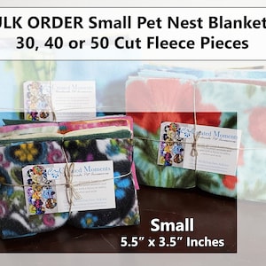 May include: Bulk order of small pet nest blankets made from cut fleece pieces. The fleece is in various colors and patterns. The blankets are tied together with twine and a business card for "Created Moments Handmade Pet Accessories" is included. The blankets measure 5.5 inches by 3.5 inches.