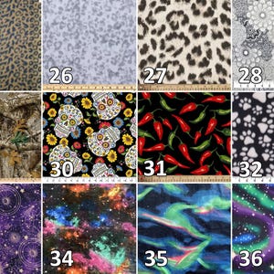 May include: A collection of twelve fabric swatches featuring various patterns including leopard print, floral mandalas, camouflage, sugar skulls with sunflowers, red and green chili peppers, white paw prints, celestial motifs, and colorful galaxy nebula designs.