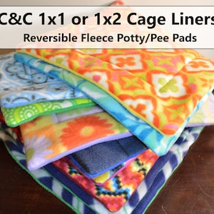 May include: A stack of colourful fleece cage liners for small pets. The liners are reversible and feature different patterns on each side. The text "C&C 1x1 or 1x2 Cage Liners" and "Reversible Fleece Potty/Pee Pads" is visible at the top of the image.