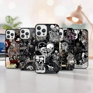 May include: A collection of black phone cases with gothic-themed designs. Each case features a unique illustration of skeletons, hearts, and text. The cases are designed for a smartphone and are displayed on a light-colored surface.