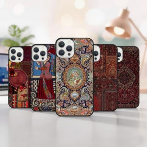 May include: Five phone cases with detailed, colourful designs inspired by Persian rugs. The cases feature intricate patterns in shades of red, blue, and gold, showcasing floral and geometric motifs. Each case has a black border.