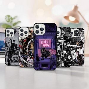 May include: A selection of phone cases with Catwoman artwork. The cases feature black and white comic book panels, with one case displaying a purple scene with the text "HELL HERE".