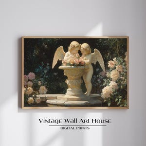 May include: A framed digital print featuring two cherubic figures with wings, standing near a stone planter filled with pink flowers. The background includes lush greenery and more pink roses. The text "VINTAGE WALL ART HOUSE DIGITAL PRINTS" is at the bottom.