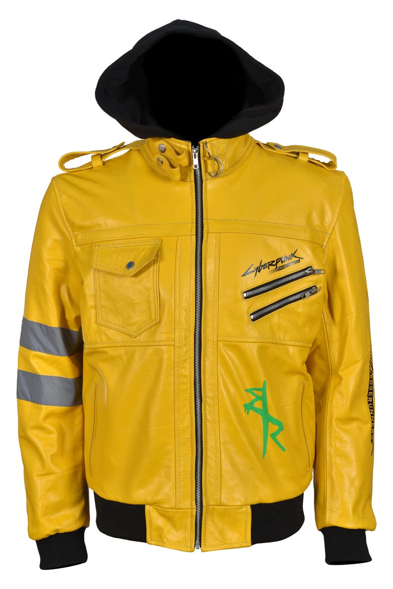 May include: A bright yellow leather jacket with a black hood. The jacket features a zip-up front, multiple pockets, and the word "Cyberpunk" printed on the chest. It has a green graphic and reflective stripes on the sleeves.