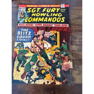 May include: Vintage comic book cover for Sgt. Fury and His Howling Commandos, issue 122. The cover features a dynamic action scene with soldiers in green uniforms, explosions, and the text "The Blitz Squad Strikes!"
