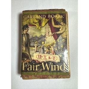 May include: Vintage paperback book titled "Fair Wind" by Garland Roark. The cover features a colorful illustration of a woman, a man, and a dinosaur. The book has a price tag of 15 cents.