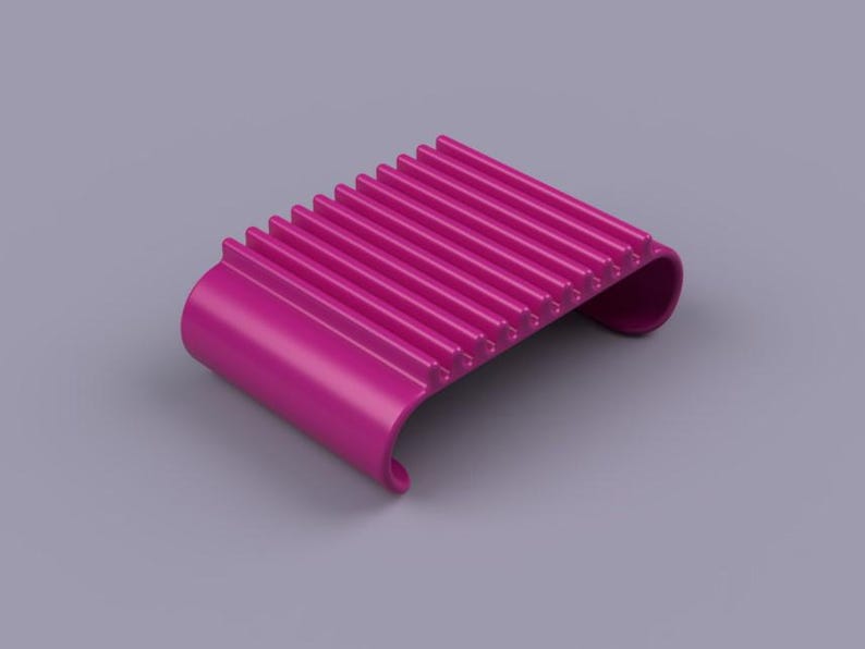 May include: A magenta-colored, curved, ribbed object. The object has a series of parallel ridges across its top surface. The ends of the object curve upwards. The background is a light purple color.