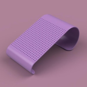 May include: A lavender-colored, curved stand with a perforated top surface. The stand has a smooth, minimalist design and is elevated on a matching lavender background. The curved shape and dotted pattern create a modern aesthetic.
