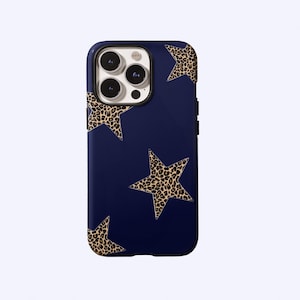 May include: A navy blue phone case featuring a pattern of leopard print stars. The case has a glossy finish and is designed to fit a smartphone. The camera lenses are visible at the top. The case is a protective accessory.