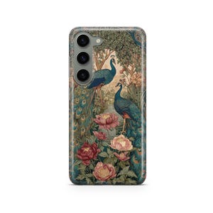 May include: A phone case featuring a detailed illustration of two peacocks in a garden setting. The design includes pink and red flowers, lush greenery, and a flowing stream. The case has a glossy finish.