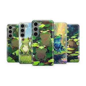 May include: A collection of phone cases featuring vibrant illustrations of frogs in a naturalistic setting. The cases showcase various frog species in lush, green environments, with detailed artwork and a range of colors.