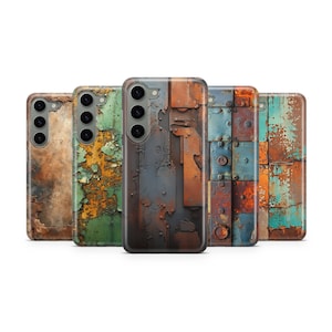 May include: A collection of five phone cases with a weathered, industrial design. The cases feature a variety of textures and colors, including rust, peeling paint, and metal panels. Each case has a camera cutout.
