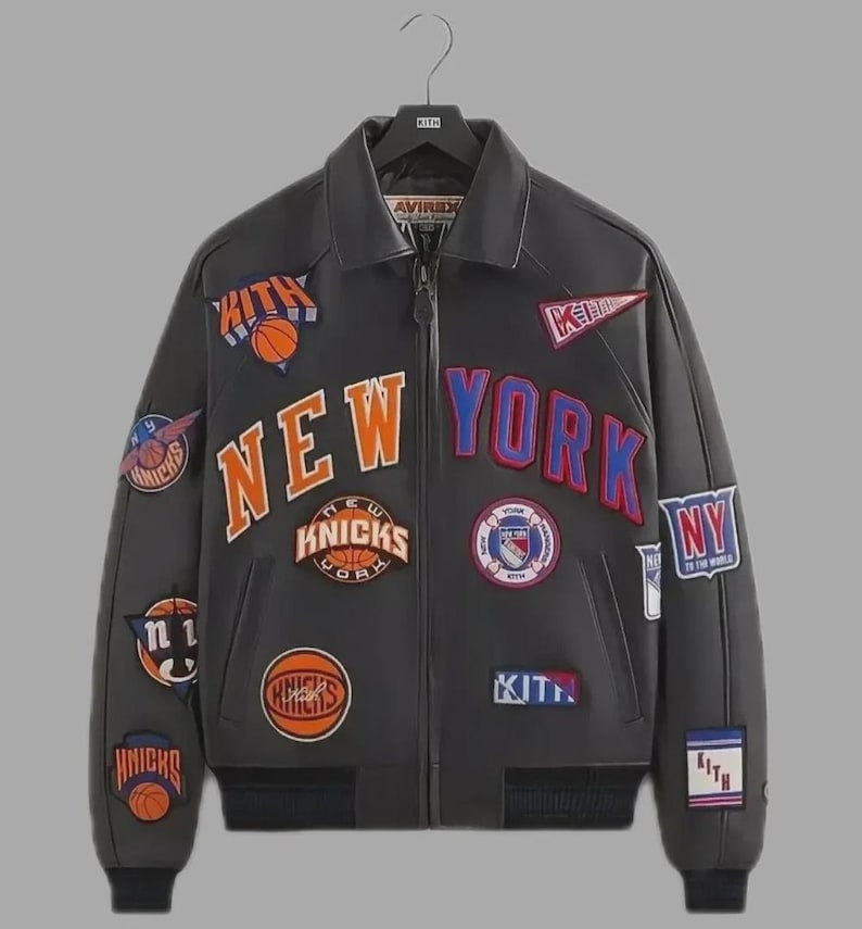 May include: A black leather jacket with multiple patches featuring the words "NEW YORK" and "KNICKS" in orange and blue. The jacket has a zip closure and a collar. The brand "KITH" is visible on some patches.
