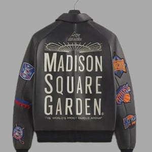 May include: Black leather jacket with the text "MADISON SQUARE GARDEN" on the back. The jacket has multiple patches with sports team logos and the words "THE WORLD'S MOST FAMOUS ARENA".