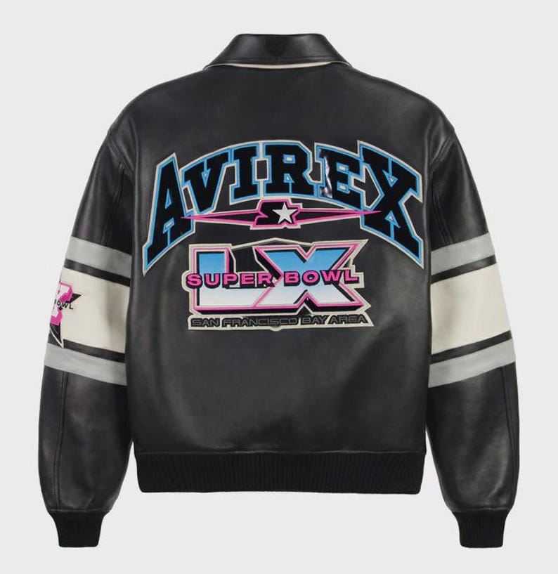 May include: Black leather bomber jacket with the word "AVIREX" in blue and pink lettering across the back. The jacket features the text "SUPER BOWL LX SAN FRANCISCO BAY AREA" in a graphic design. White and gray stripes adorn the sleeves.