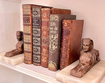 Egyptian Revival Sphinx bookends 1920s finely cast forms on alabaster bases, neoegyptian, pharaoh, lion