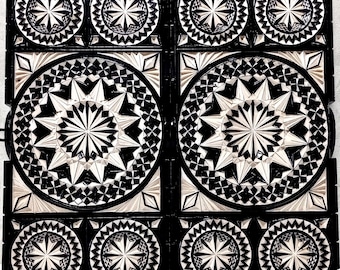 Handcrafted wooden backgammon with geometric carvings.
