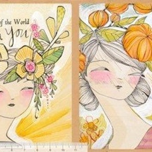 May include: Two art prints featuring illustrated women with floral headpieces. One print has the text "The Light of the World is in You." The other print has the text "Our Purpose is to Flower" and a bird. The artwork is in soft colors.