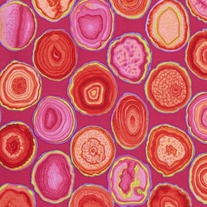 May include: A vibrant pattern featuring numerous circular agate slices in shades of red, pink, and orange, set against a deep pink background. Each slice has a unique concentric design with yellow and purple outlines, creating a colorful and textured effect.