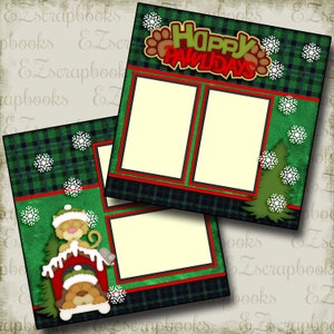 May include: A green and red plaid scrapbook page with two photo frames and a festive "Happy Pawlidays" title. The page is decorated with snowflakes and a small Christmas tree.