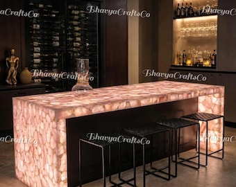 Dessus de bar rétroéclairé en quartz rose, îlot de cuisine en cristal rose de luxe