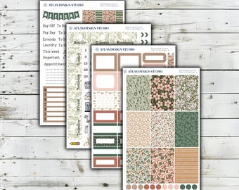 May include: Four sheets of planner stickers by Atlas Design Studio featuring an Enchanted Forest theme. The sheets include various rectangular boxes, floral and botanical patterns in shades of green, pink, and tan, and text labels for days.