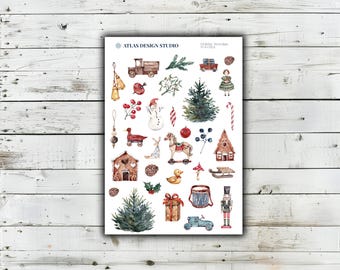 May include: A sticker sheet titled ATLAS DESIGN STUDIO Holiday Nostalgia DX 02.2 featuring watercolor illustrations of Christmas elements including a snowman, gingerbread house, nutcracker, toy horse, pine trees, gift, drum, and various holiday ornaments.