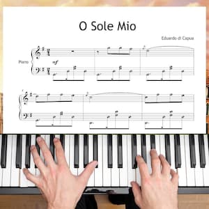 May include: A piano keyboard with black and white keys and a sheet music page titled O Sole Mio by Eduardo di Capua positioned above. The musical notation features a treble and bass clef staff with a two-four time signature and mezzo-forte markings.