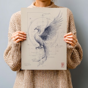May include: A detailed drawing of a phoenix with outstretched wings, rendered in shades of blue and gray. The artwork is set against a beige background with architectural-style lines and a circular design. The print includes text and a small red emblem.