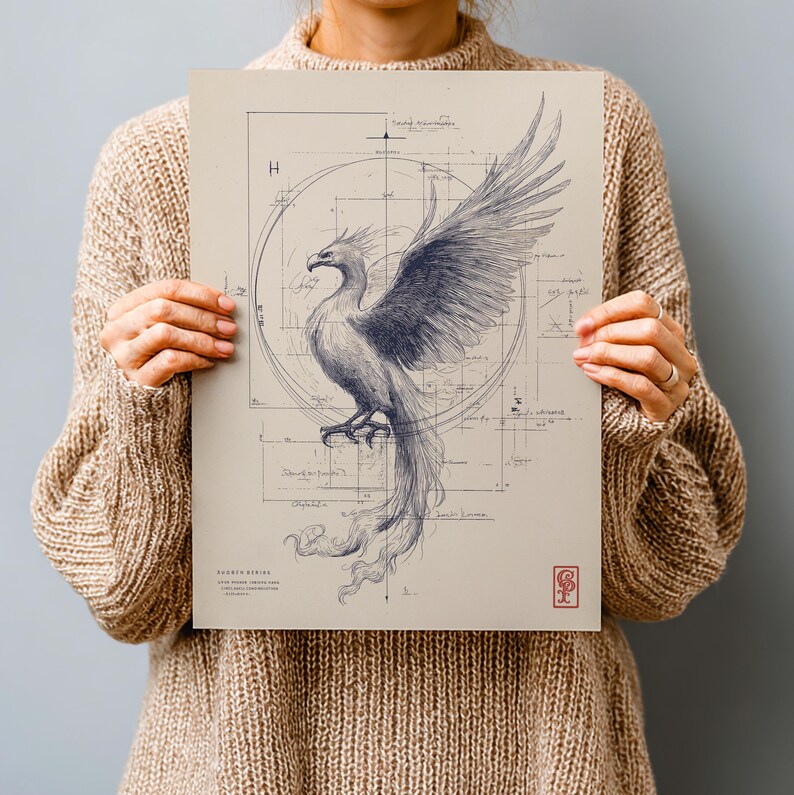May include: A detailed drawing of a phoenix with outstretched wings, rendered in shades of blue and gray. The artwork is set against a beige background with architectural-style lines and a circular design. The print includes text and a small red emblem.