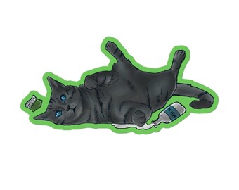 Naklejka winylowa z zabawnym pręgowanym kotem, kocimiętką i mlekiem